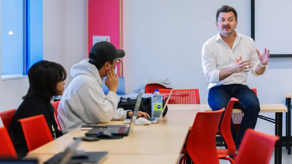 Professor in classroom with students