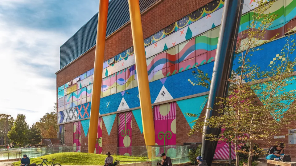 100 McCaul facade with bright coloured mural