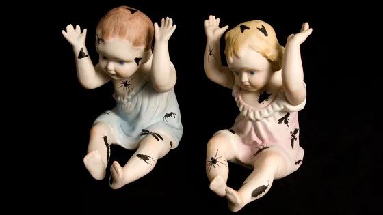 two ceramic dolls