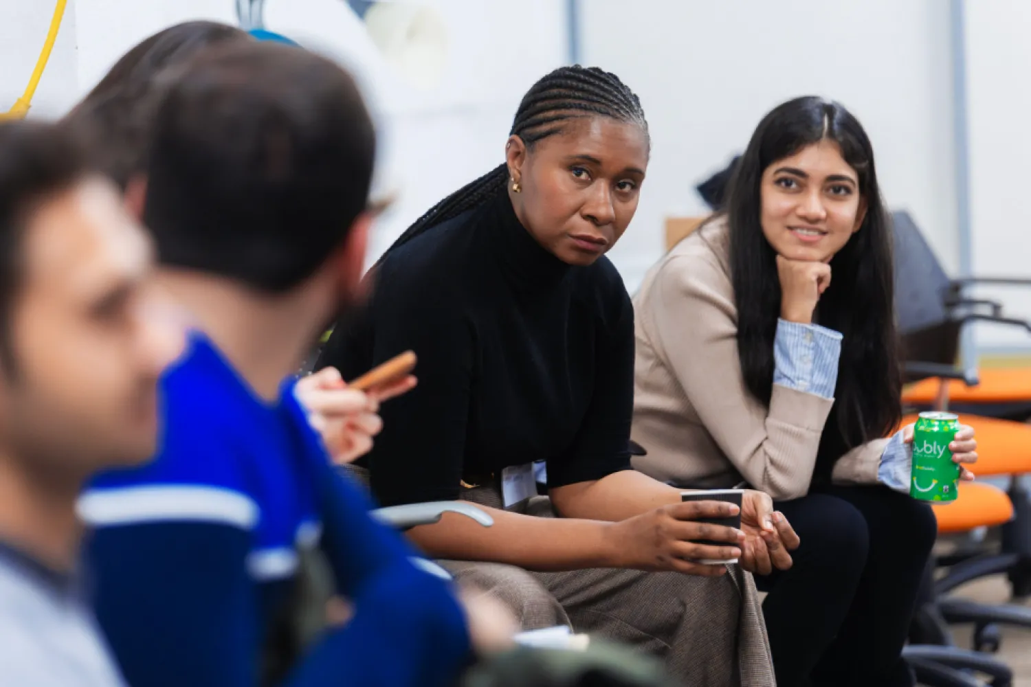 Students in a classroom listening intently