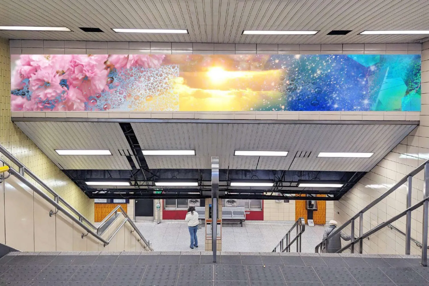 View of descending stairs at Christie Station with virtual mock-up of art installation overhead. 