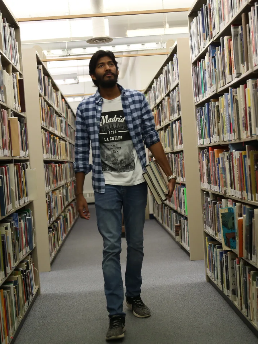 Student in the stacks