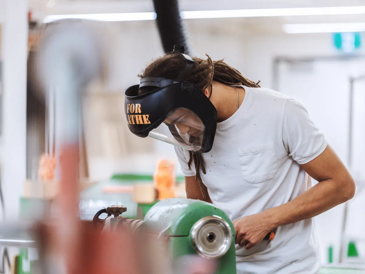 Student working on lathe