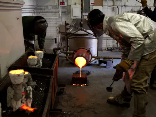 Pouring liquid metal into a mold