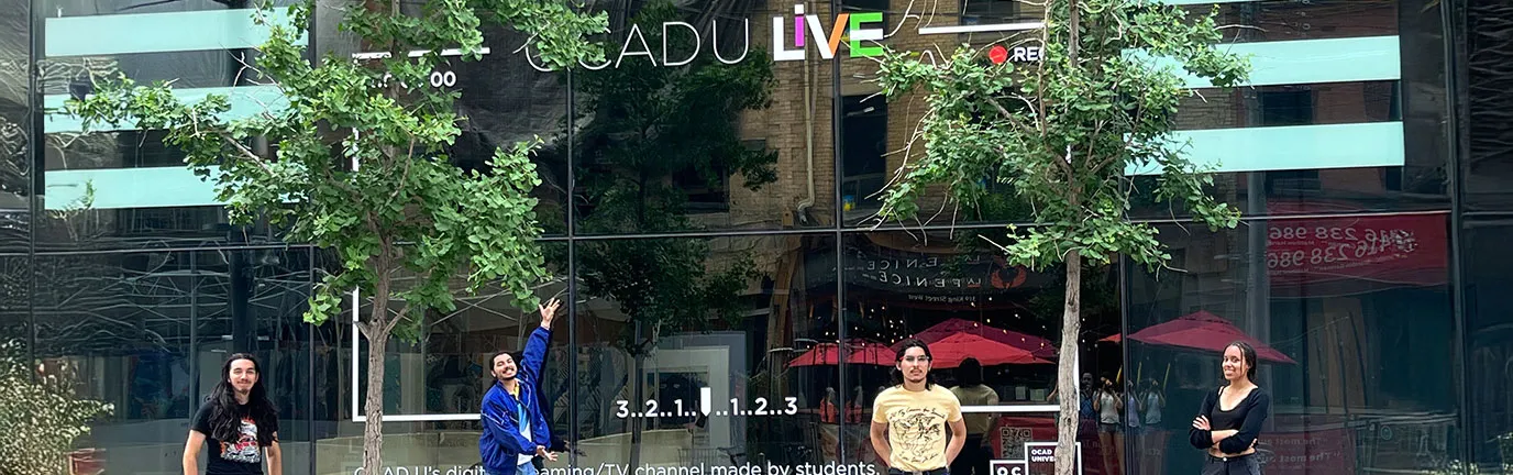 Students in front of the OCADU Live windows