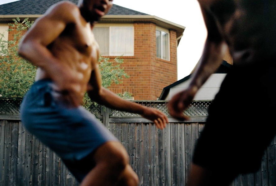 Brothers at Play, 2021, Analogue Photography, 12 x 18 inches © Joy Adeola, courtesy of the artist
