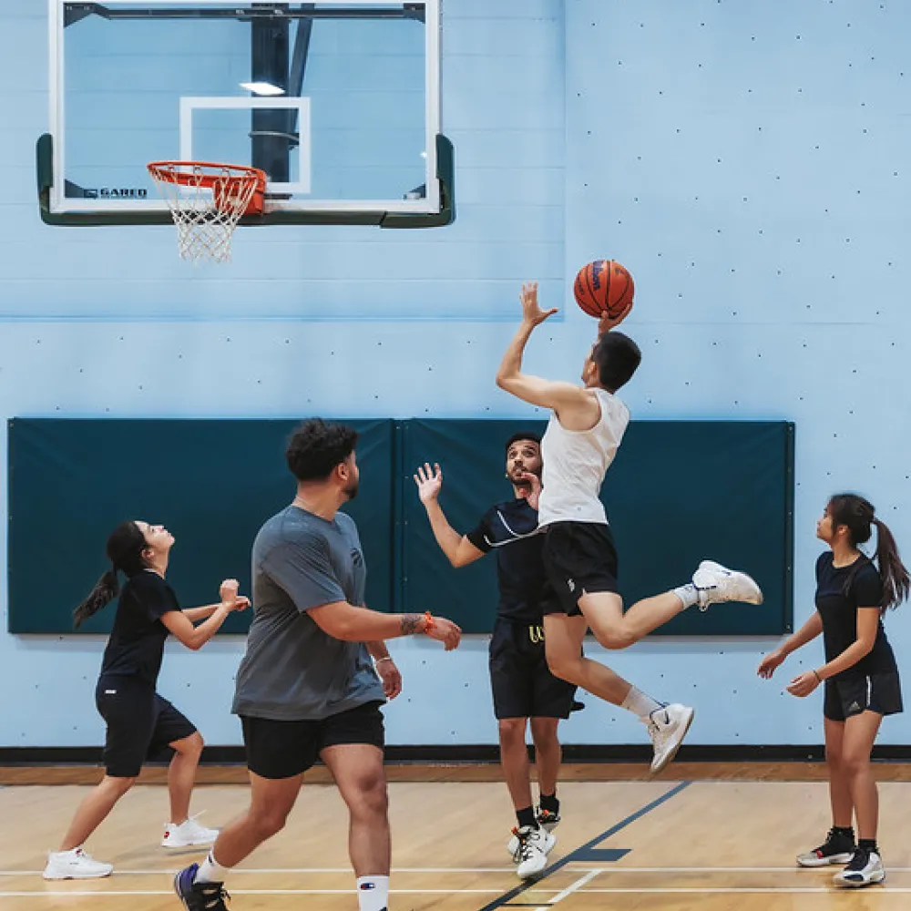 Students playing basketball