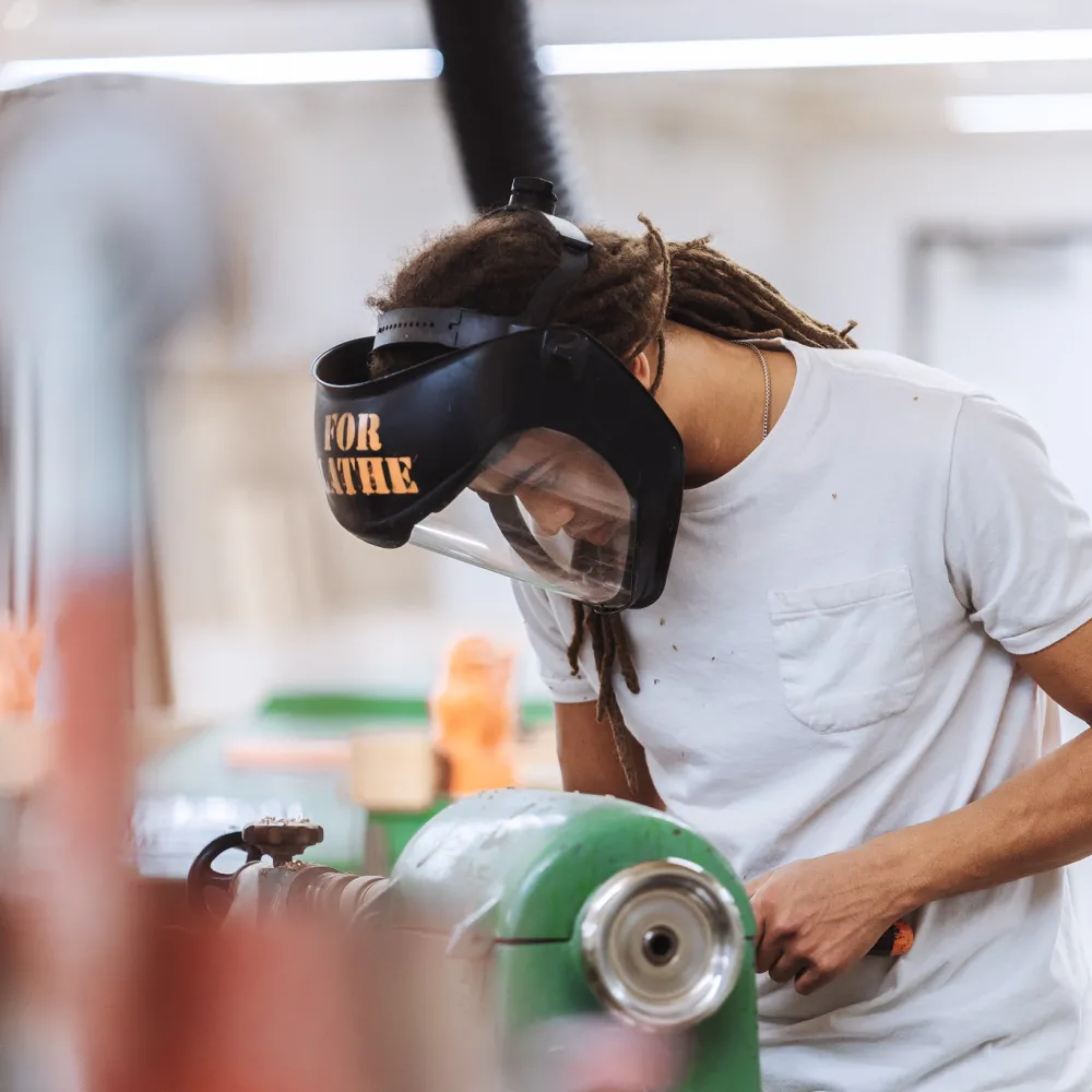 Student at a lathe