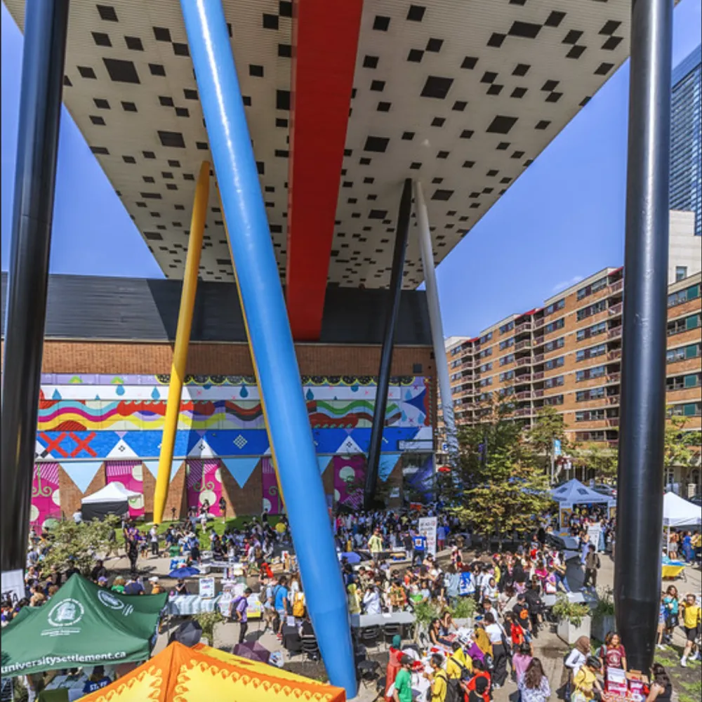 Crowd of people under the Sharp Centre