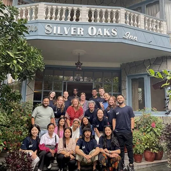 Group of participants in front of an old building